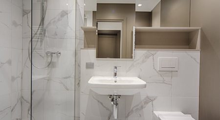 marble interior of bathroom with toilet